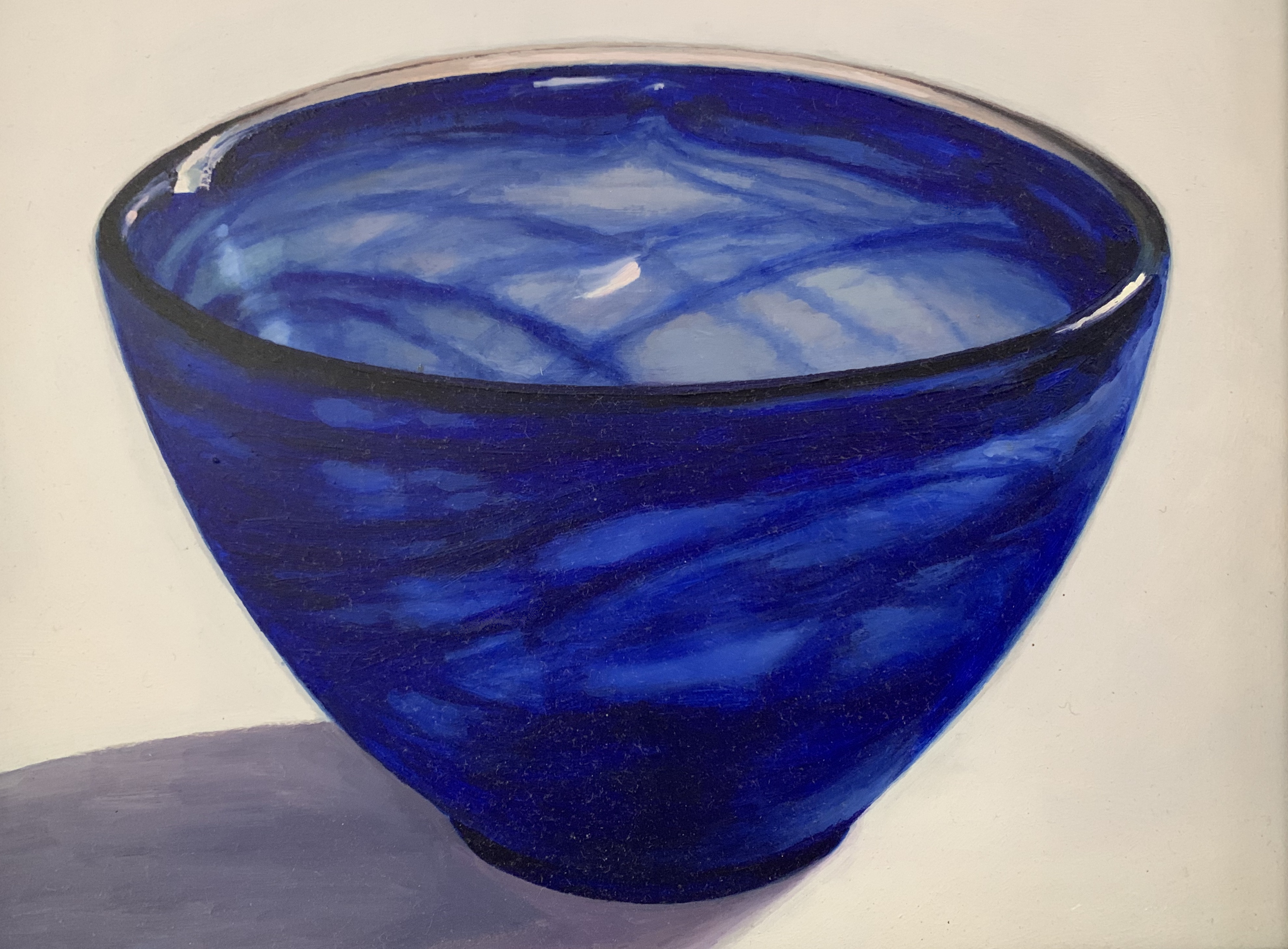 blue glass bowl with white cloth