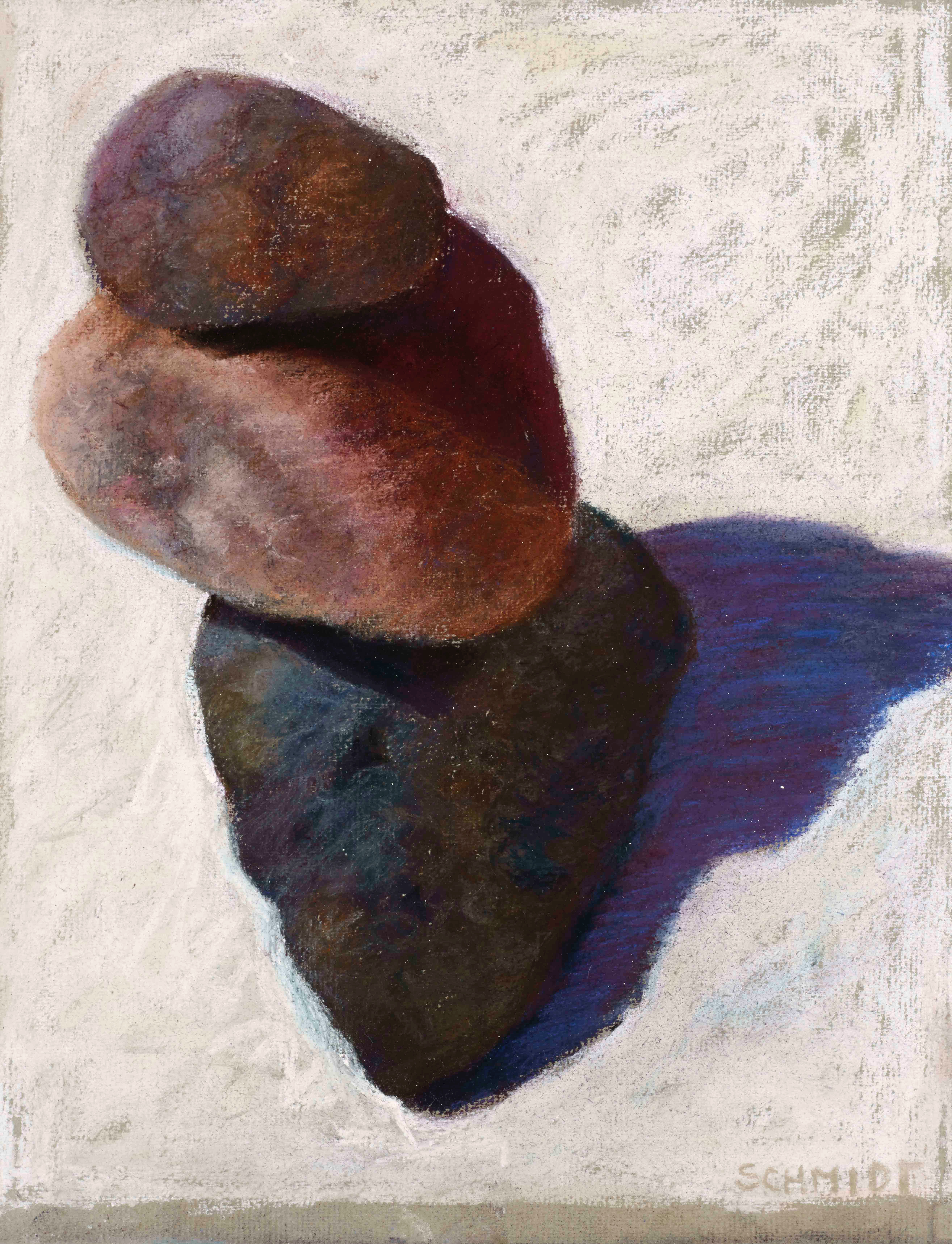 3 rocks stacked different colors